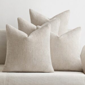 neutral chenille farmhouse pillow cover styled on living room sofa