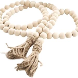 boho wood bead garland styled on coffee table tray