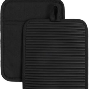 Bamboo kitchen drawer organizer trays neatly arranged in kitchen drawer