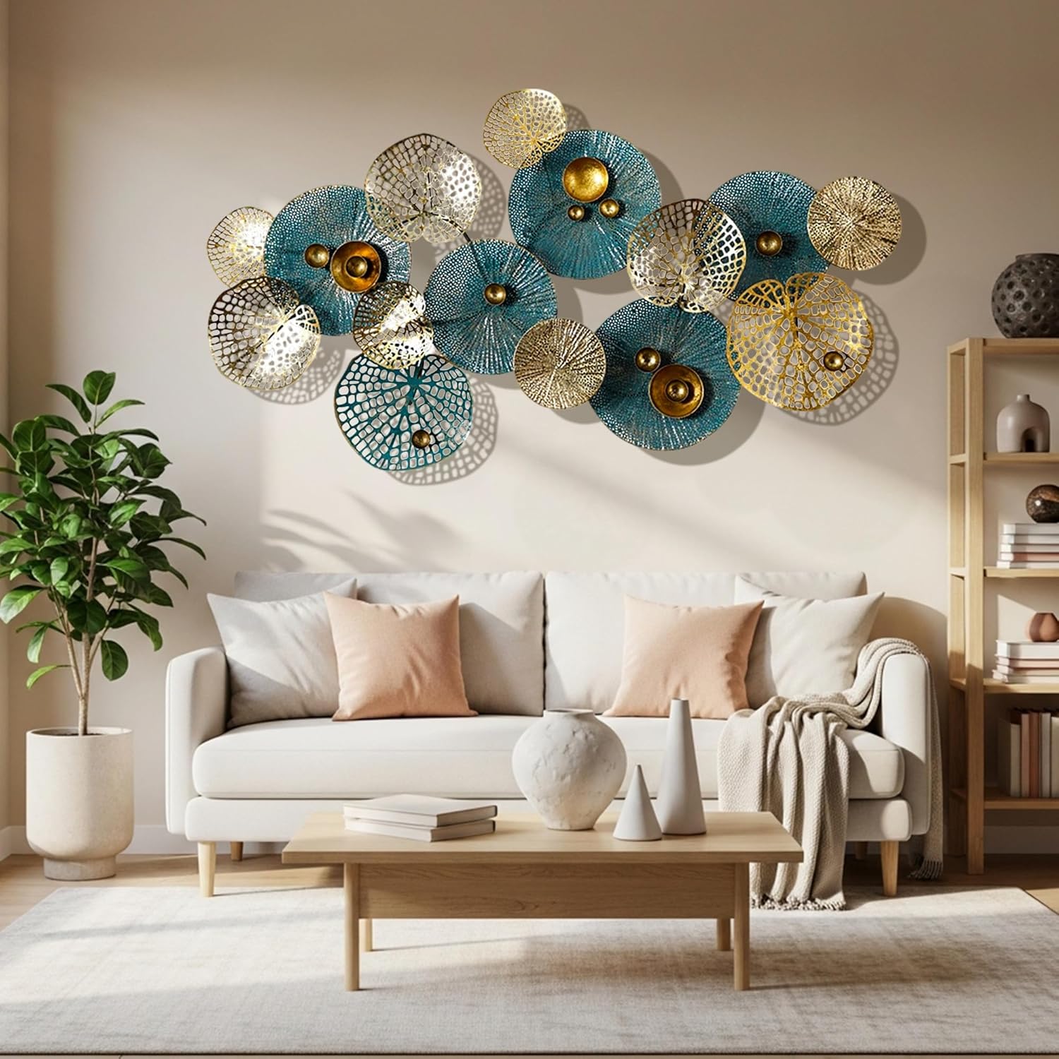 Modern Metal Flower Wall Art for Living Room in Blue and Gold Modern metal flower wall art in blue and gold above a beige sofa in a contemporary living room, creating a bold statement wall decor focal point