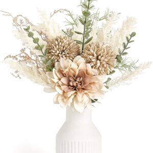 neutral artificial flowers styled in ceramic vase on coffee table