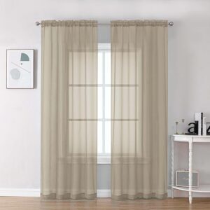 Neutral linen blend curtains in a bright minimalist bedroom setting