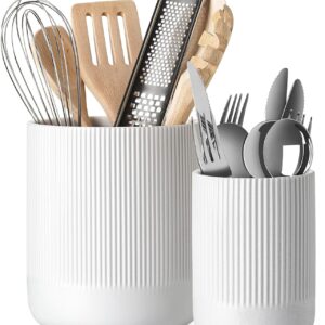 Neutral kitchen utensil holder with wooden spoons on modern countertop