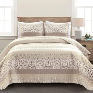 Neutral oversized quilt layered on soft minimalist bed