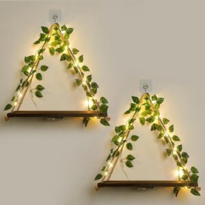 Minimalist triangle floating wall shelf set with LED vine lights and faux greenery, perfect for boho wall decor, cozy bedroom decor, apartment decor, and minimalist room design.